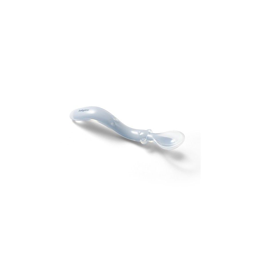 Une cuillère en silicone élastique bleue