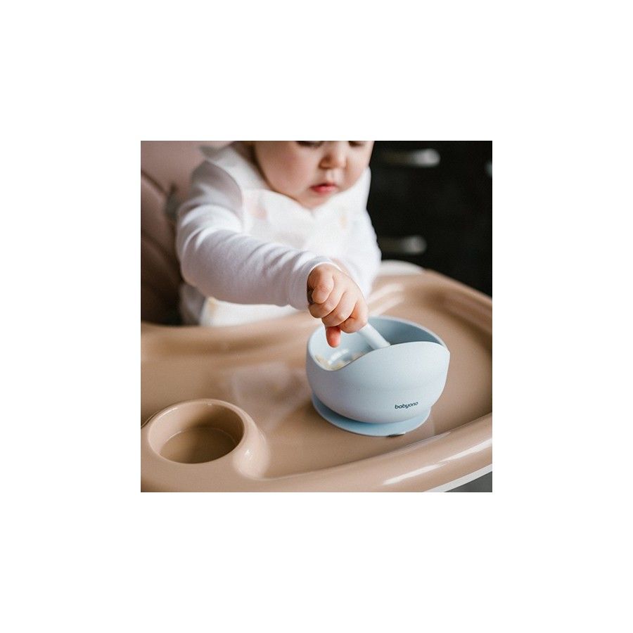 Papillon Un bol en silicone avec une sucette bleue
