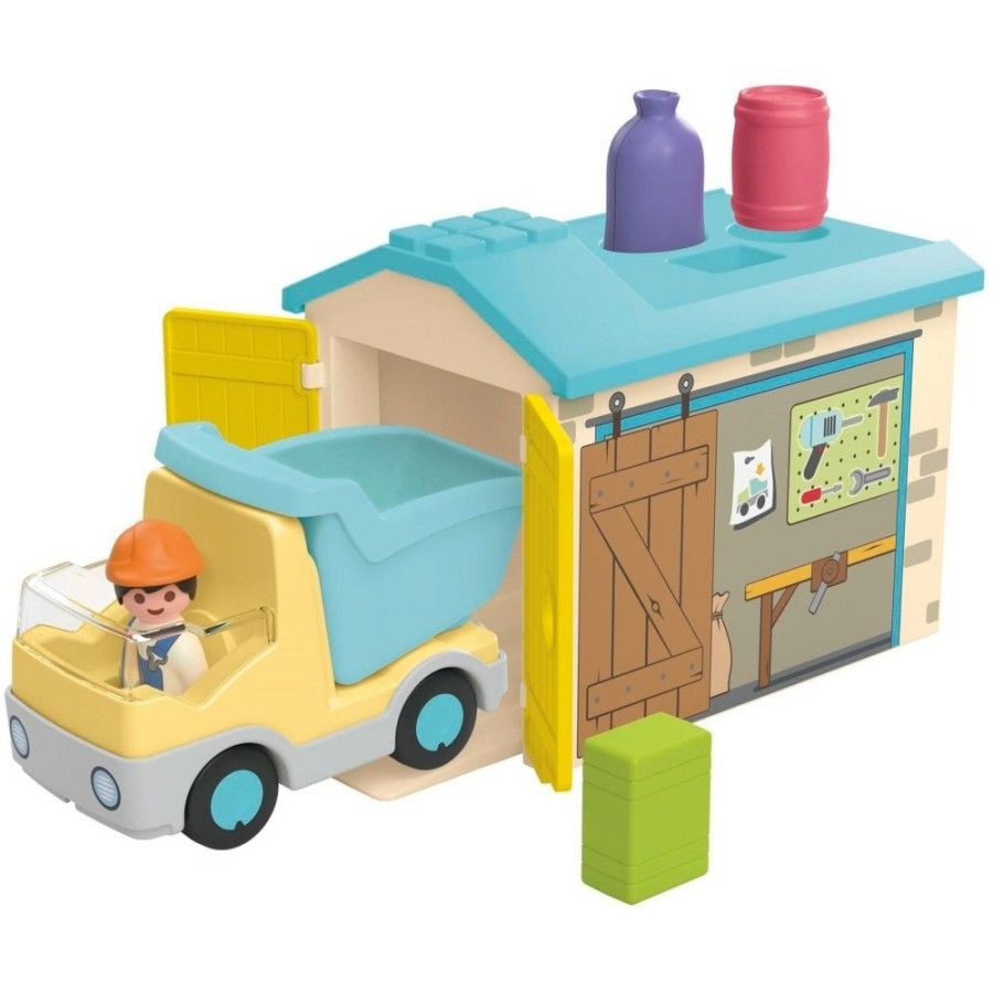 Playmobil JUNIOR: Ciężarówka z garażem z funkcją s