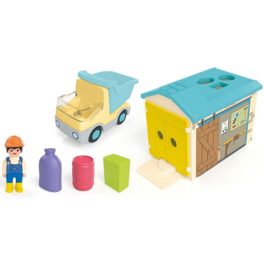 Playmobil JUNIOR: Ciężarówka z garażem z funkcją s