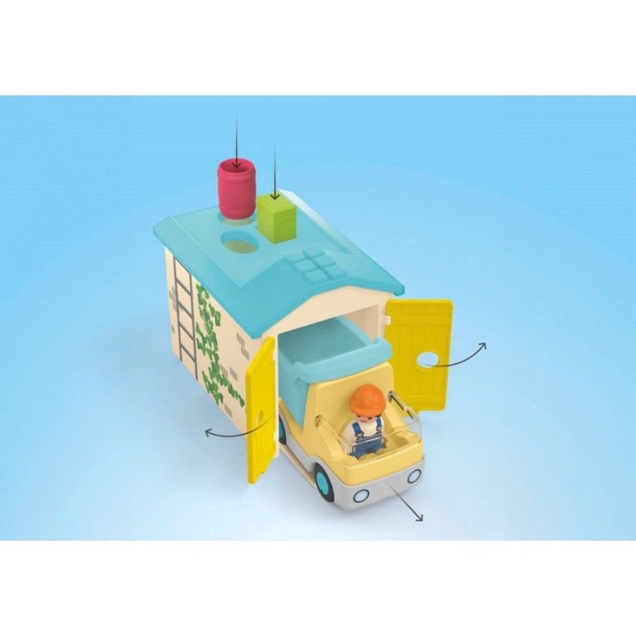 Playmobil JUNIOR: Ciężarówka z garażem z funkcją s