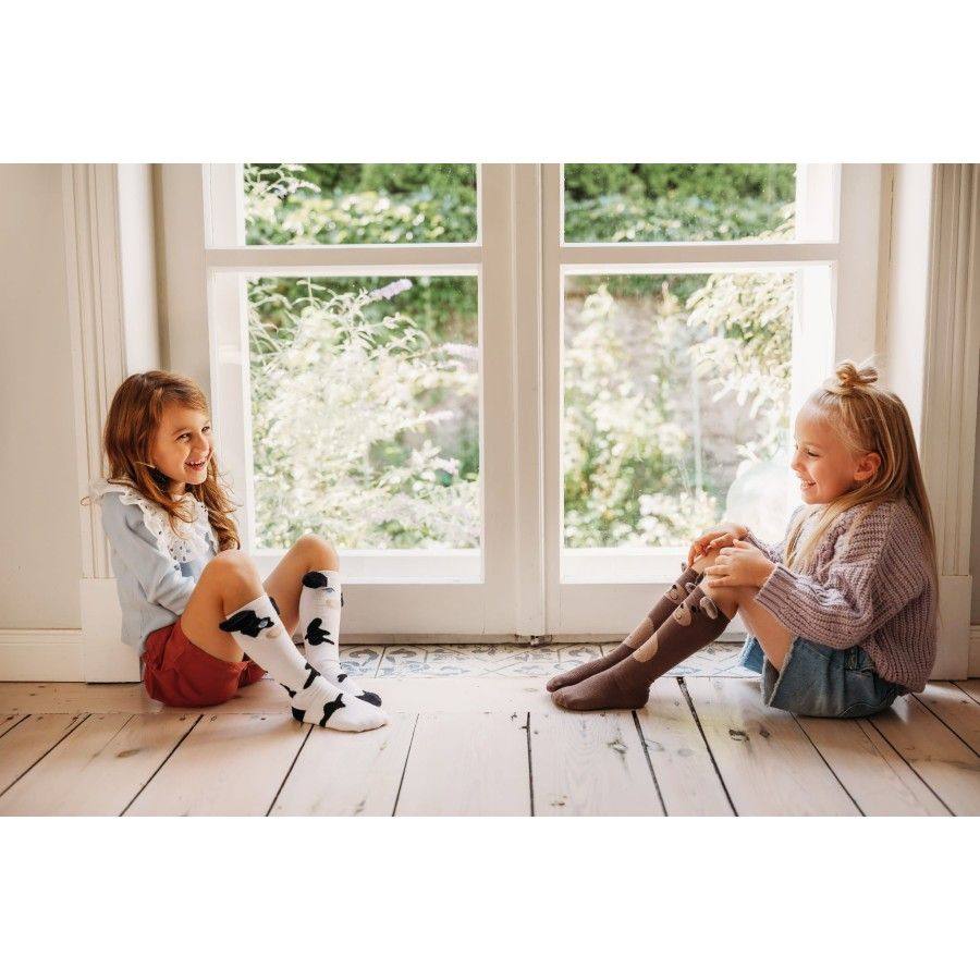 Les pieds de maman Les genoux de bébé