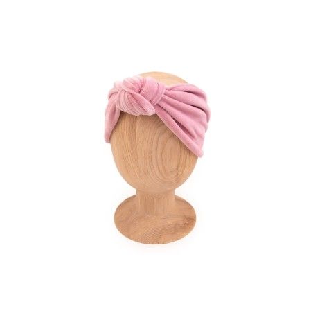UNE PLAIE, UNE CEINTURE SUR LA TÊTE, UNE COQUILLE DE VELOURS ROSE
